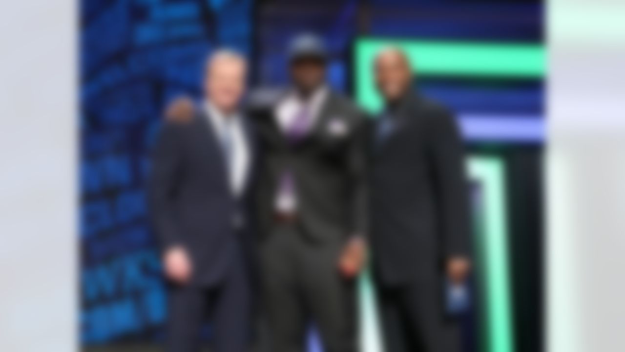 Alabama defensive tackle Jarran Reed poses for a photo with NFL Commissioner Roger Goodell and former Seattle Seahawks player Shaun Alexander after being selected by the Seahawks during the 2016 NFL Draft at the Auditorium Theatre on Friday, April 29, 2016 in Chicago. (Perry Knotts/NFL)