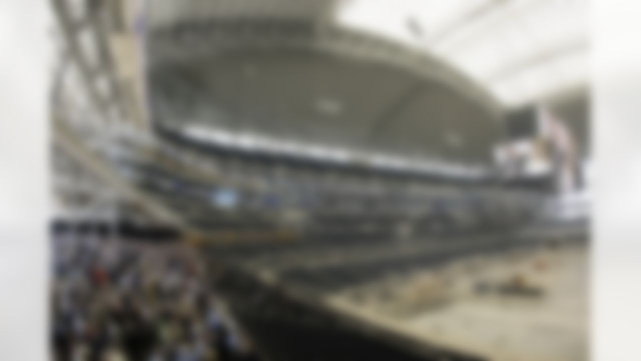 Guests mingle in the West Plaza of the new Cowboys Stadium after a ribbon-cutting ceremony, Wednesday, May 27, 2009, in Arlington, Texas. (AP Photo/Matt Slocum)