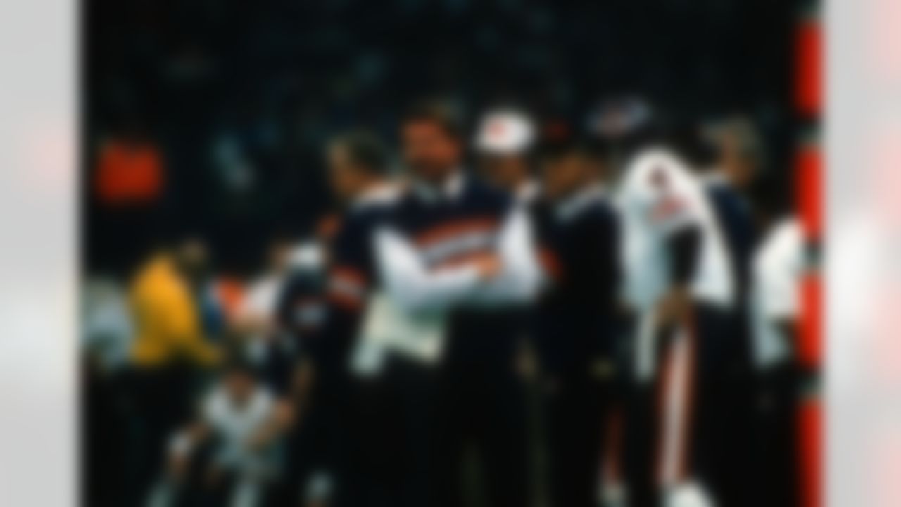 Chicago Bears head coach, Mike Ditka, being carried off the field on the shoulders of the Chicago Bears football team, after the Chicago Bears won Super Bowl XX at the Louisiana Superdome in New Orleans, LA on January 26, 1986. (AP Photo/Warren Wimmer)