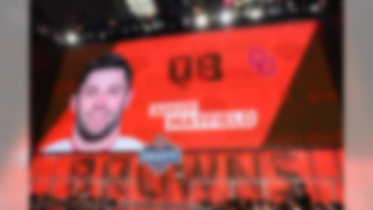 With the first pick in the 2018 Draft, the Cleveland Browns draft, Baker Mayfield out of Oklahoma. 

 Baker Mayfield is the 6th QB the Browns have selected in the first round during the Common Draft Era. None of the previous 5 had a winning record with the Browns or made a Pro Bowl, per NFL Research.

 Mayfield is the 7th quarterback to win the Heisman Trophy and be selected 1st overall in the Common Draft Era, per NFL Research.

 Mayfield averaged 9.8 yards per. Highest yards/attempt of any FBS QB in the last 15 seasons (min. 850 pass attempts), per NFL Research.

 Only 2 quarterbacks in the Common Draft Era have been selected #1 overall despite measuring in under 6-foot-3: Michael Vick (6'0") and Baker Mayfield (6'1"), per NFL Research.