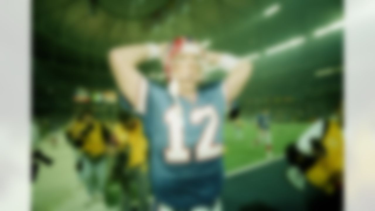 Buffalo Bills' Jim Kelly leaves the field after his team lost the Super Bowl to the Dallas Cowboys Jan. 30, 1994, at the Georgia Dome in Atlanta. In a rematch to last year's Super Bowl, the Cowboys repeated the outcome, this time with a score of 30-13. (AP Photo/Amy Sancetta)