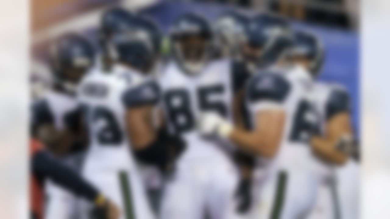 Seattle Seahawks tight end Anthony McCoy reacts with teammates after scoring against the San Diego Chargers during the second half of a preseason NFL football game Thursday, Aug. 11, 2011, in San Diego. (AP Photo/Mark J. Terrill)