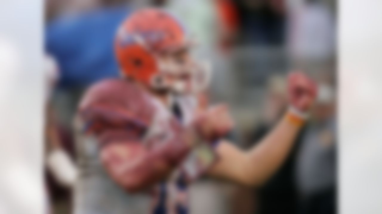 Florida quarterback Tim Tebow celebrates his second-quarter touchdown during an NCAA college football game against Florida State,Saturday, Nov. 29, 2008, in Tallahassee, Fla. Florida won, 45-15. (AP Photo/Steve Cannon)