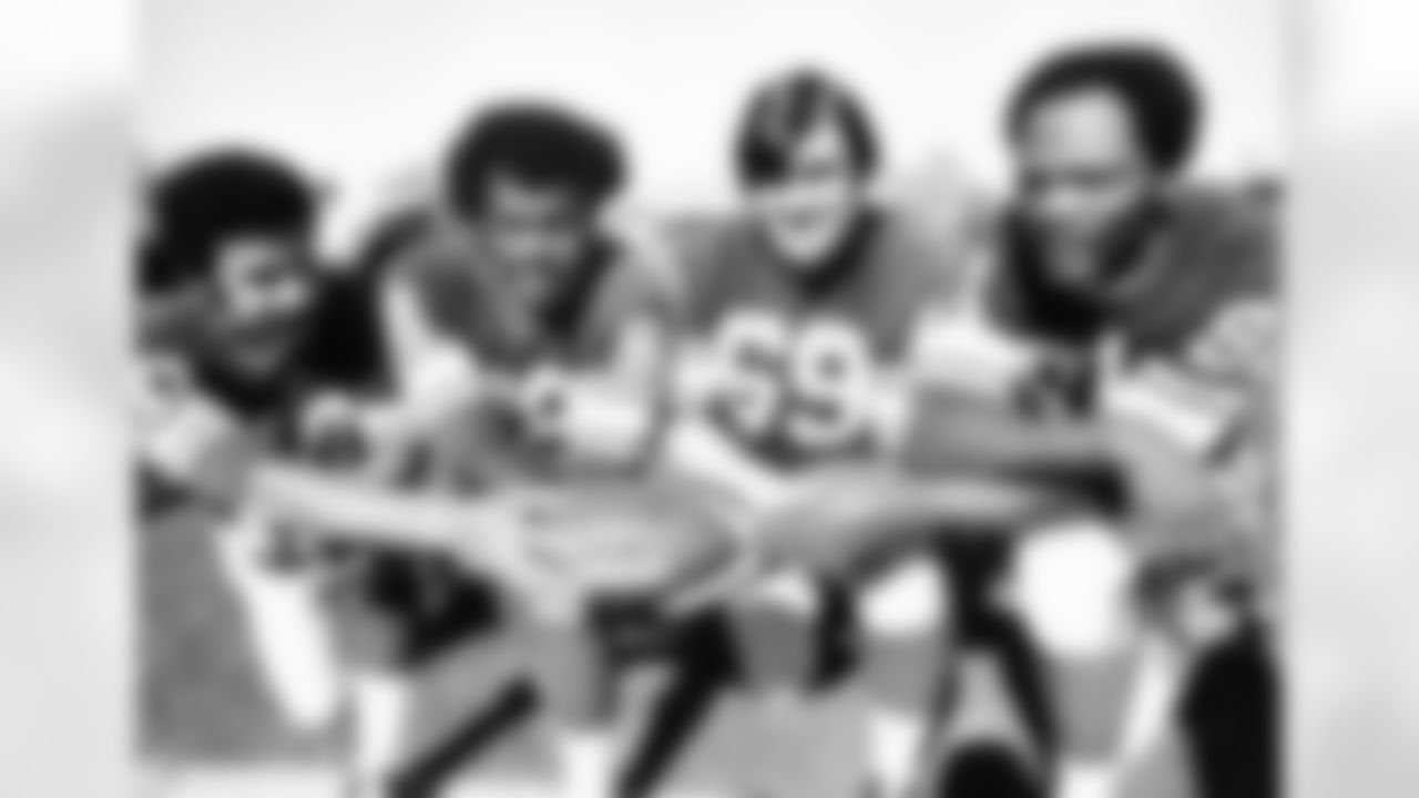 These are four of the defensemen of the Minnesota Vikings. From left are end Jim Marshall, tackle Alan Page, tackle Doug Sutherland and end Carl Eller. They met the Pittsburgh Steelers in the Super Bowl game in New Orleans, on Sunday, Jan. 9, 1975. (AP Photo)