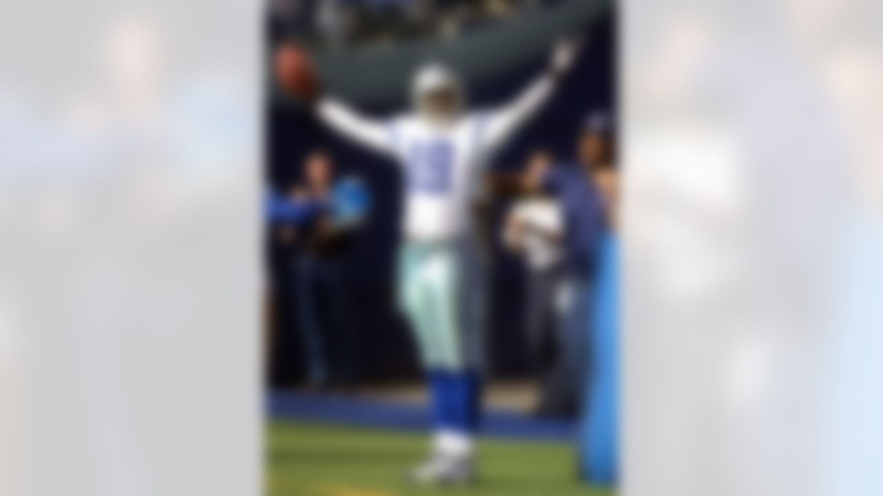 Dallas Cowboys Keyshawn Johnson (19) celebrates a fourth quarter touchdown against the Detroit Lions in Irving, Texas, Sunday, Oct. 31, 2004. Dallas won, 31-21.