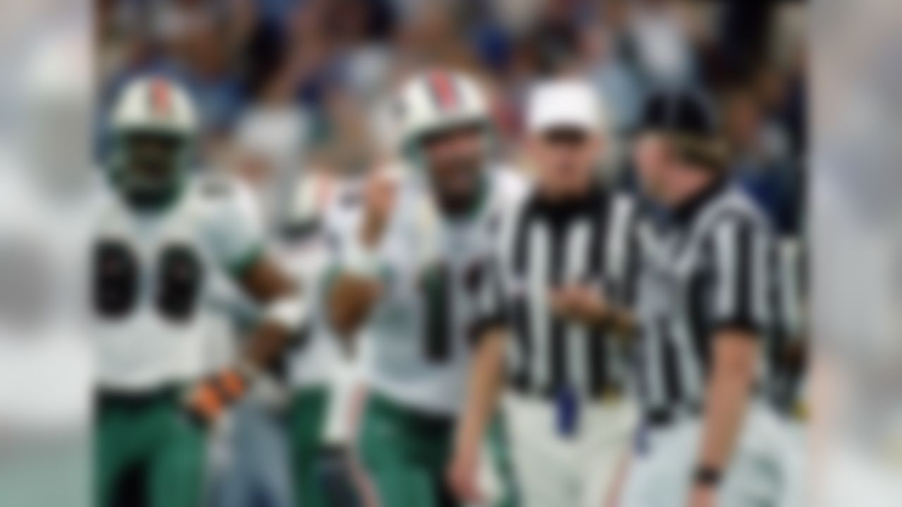 10 Oct 1999: Quarterback Dan Marino #13 of the Miami Dolphins talks to the referee during a game against the Indianapolis Colts at the RCA Dome in Indianapolis, Indiana. The Dolphins defeated the Colts 34-31. (Matthew Stockman/Allsport)