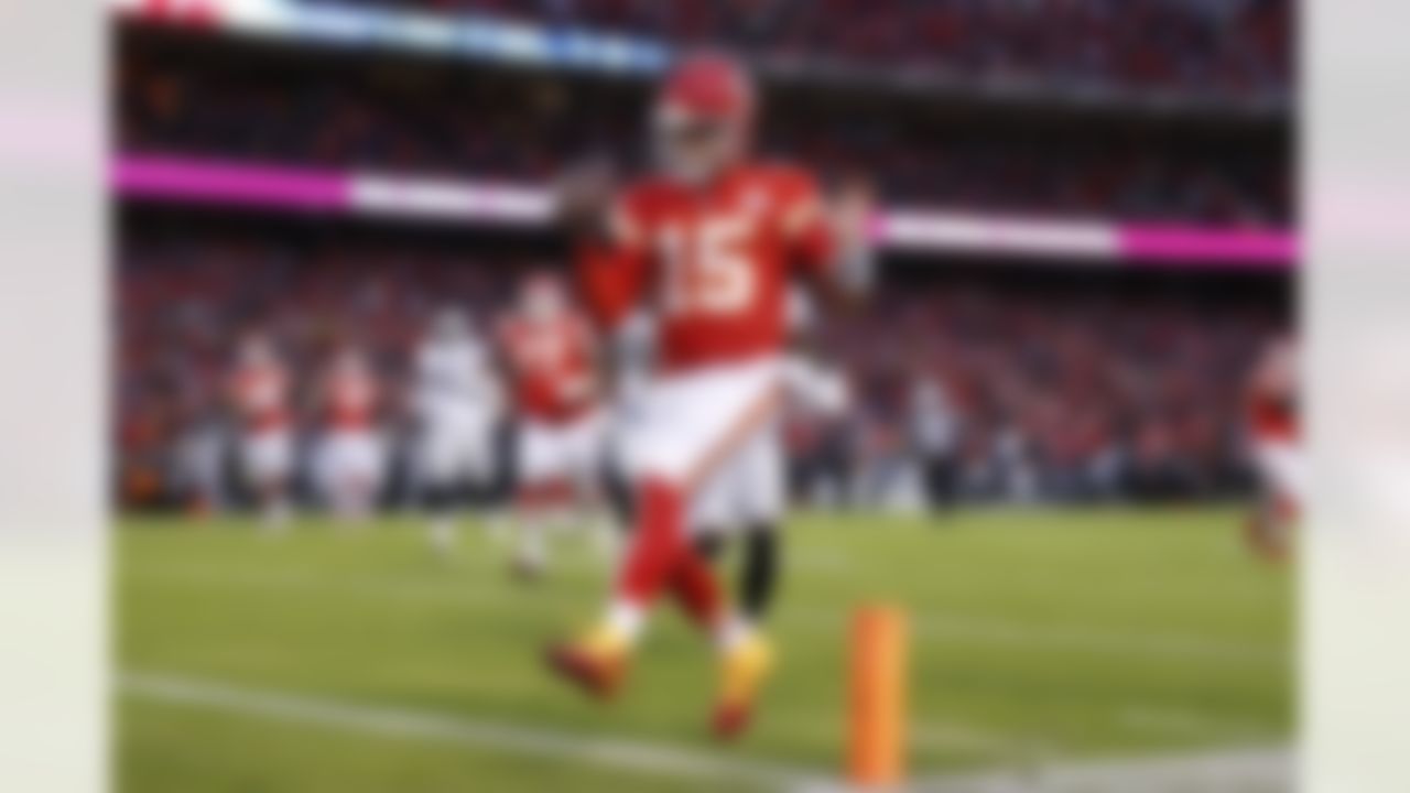 Kansas City Chiefs quarterback Patrick Mahomes (15) runs a touchdown during an NFL football game against the Oakland Raiders, Sunday, Dec. 1, 2019 in Kansas City, Mo.