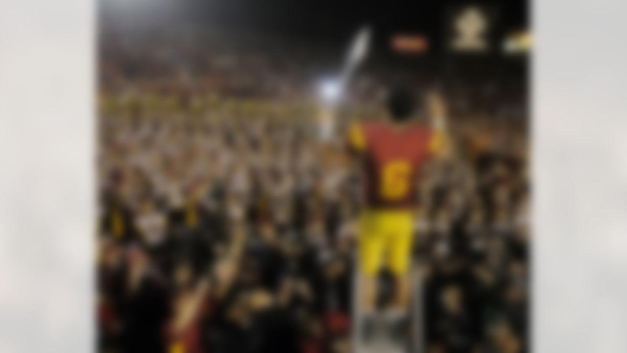 Southern California quarterback Mark Sanchez celebrates after USC beat Penn State 38-24 in the Rose Bowl NCAA college football game in Pasadena, Calif., Thursday, Jan. 1, 2009. (AP Photo/Mark J. Terrill)