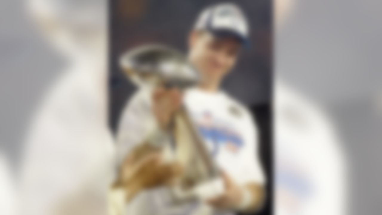 Indianapolis Colts' Peyton Manning (18) holds the Vince Lombardi Trophy after the Colts' 29-17 win over the Chicago Bears in the Super Bowl XLI football game at Dolphin Stadium in Miami on Sunday, Feb. 4, 2007. (AP Photo/Amy Sancetta)
