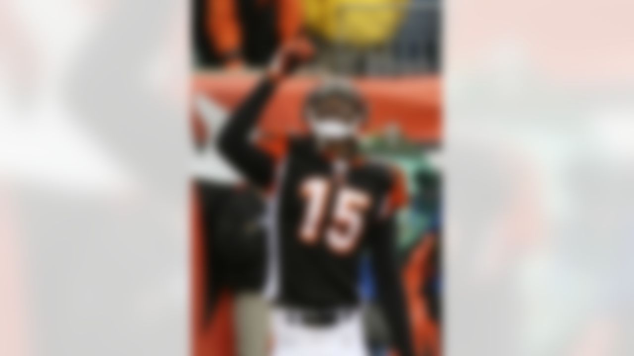 Cincinnati Bengals receiver Chris Henry celebrates after scoring a touchdown against the Washington Redskins in an NFL football game, Sunday, Dec. 14, 2008, in Cincinnati. (AP Photo/Tom Uhlman)