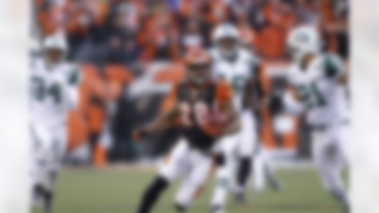Cincinnati's Bernard Scott runs the ball during the first quarter of the AFC wild-card game against the New York Jets on Saturday, January 9, 2010 in Cincinnati. (Joe Robbins / NFL.com)