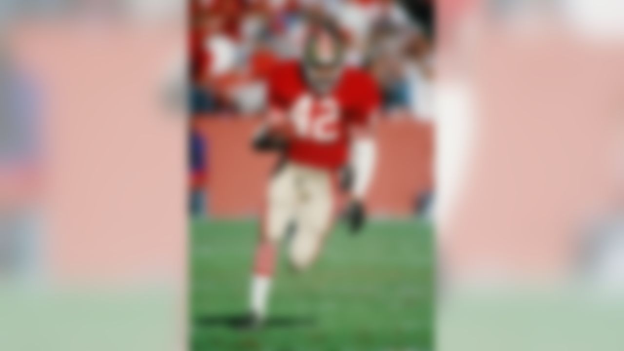 San Francisco 49ers cornerback Ronnie Lott (42) runs with the ball during the NFC Divisional Playoff NFL football game against the Minnesota Vikings on January 1, 1989 in San Francisco, CA. The 49ers won the game 34-9. (AP Photo/Paul Spinelli)