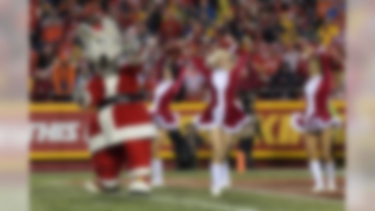 Kansas City Chiefs mascot and Chiefs cheerleaders perform in Christmas costumes during a NFL football game against the Denver Broncos in Kansas City, Mo, on Sunday, Dec. 25, 2016. (Kirby Lee/NFL)