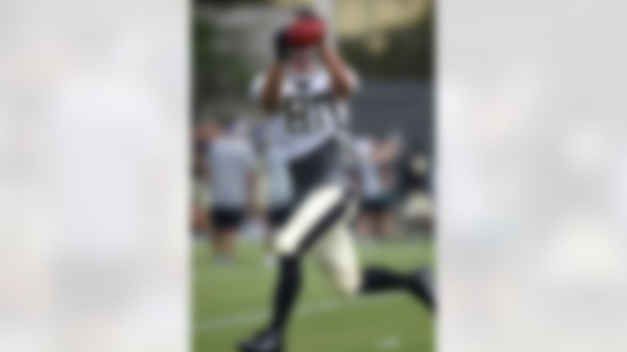 New Orleans Saints tight end Jimmy Graham (80) catches a pass during training camp at their NFL football training facility in Metairie, La., Saturday, July 28, 2012. (AP Photo/Gerald Herbert)