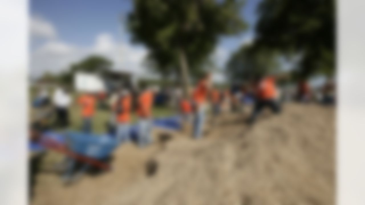 The Home Depot NFL Neighborhood MVP Build with Miami Dolphins Offensive Tackle Vernon Carey. (Photo by Andrew Coppley, CIA Stock Photography, Inc.)