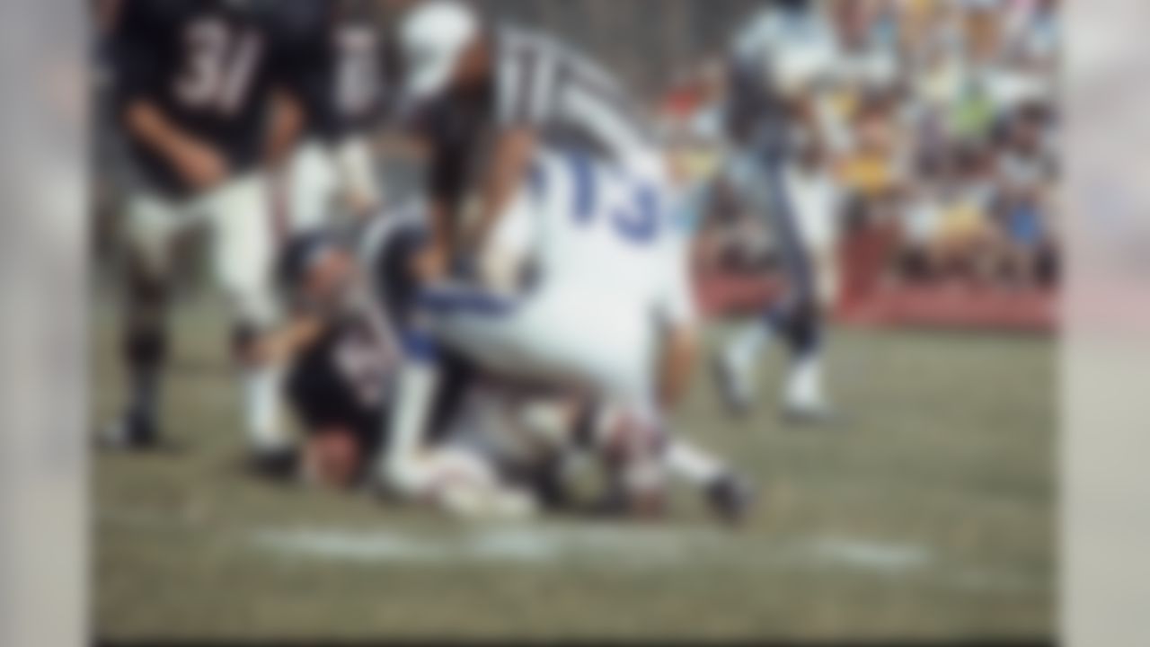 Linebacker Dick Butkus #51 of the Chicago Bears mixes it up with wide receiver Lance Rentzel #13 of the Los Angeles Rams at the Los Angeles Memorial Coliseum on October 3, 1971 in Los Angeles, California. (National Football League)