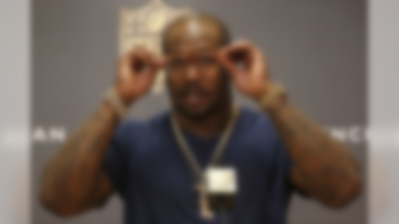 Denver Broncos outside linebacker Von Miller adjusts his glasses during a press conference following the NFL football AFC Championship game between the Denver Broncos and the New England Patriots, Sunday, Jan. 24, 2016, in Denver. The Broncos defeated the Patriots 20-18 to advance to the Super Bowl. (AP Photo/David Zalubowski)