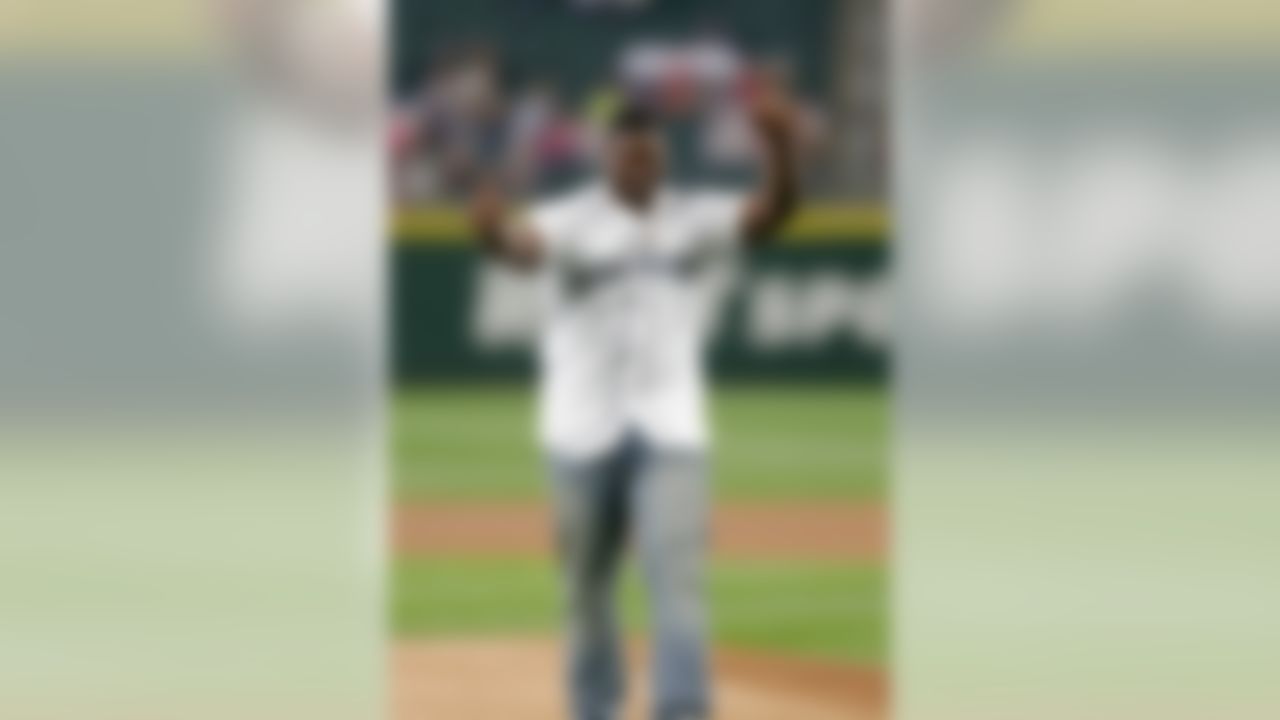 Jarran Reed, Seattle Seahawks defensive tackle, selected in the second round of the 2016 NFL draft, throws out the first pitch before a baseball game between the Texas Rangers and the Seattle Mariners Friday, June 10, 2016, in Seattle. (AP Photo/John Froschauer)