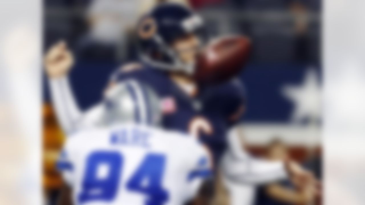 Dallas Cowboys linebacker DeMarcus Ware (94) causes Chicago Bears quarterback Jay Cutler (6) to fumble the ball during the second half of an NFL football game, Monday, Oct. 1, 2012, in Arlington, Texas. (AP Photo/Sharon Ellman)