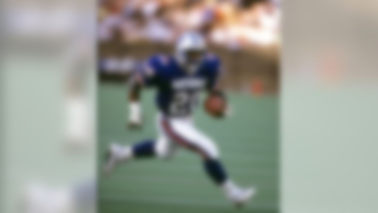 NFC Hall of Fame running back Barry Sanders (20) of the Detroit Lions carries the football during the NFC's 21 - 15 victory over the AFC in the 1992 NFL Pro Bowl played on February 2, 1992 at Aloha Stadium in Honolulu, Hawaii. (AP Photo / Al Messerschmidt)