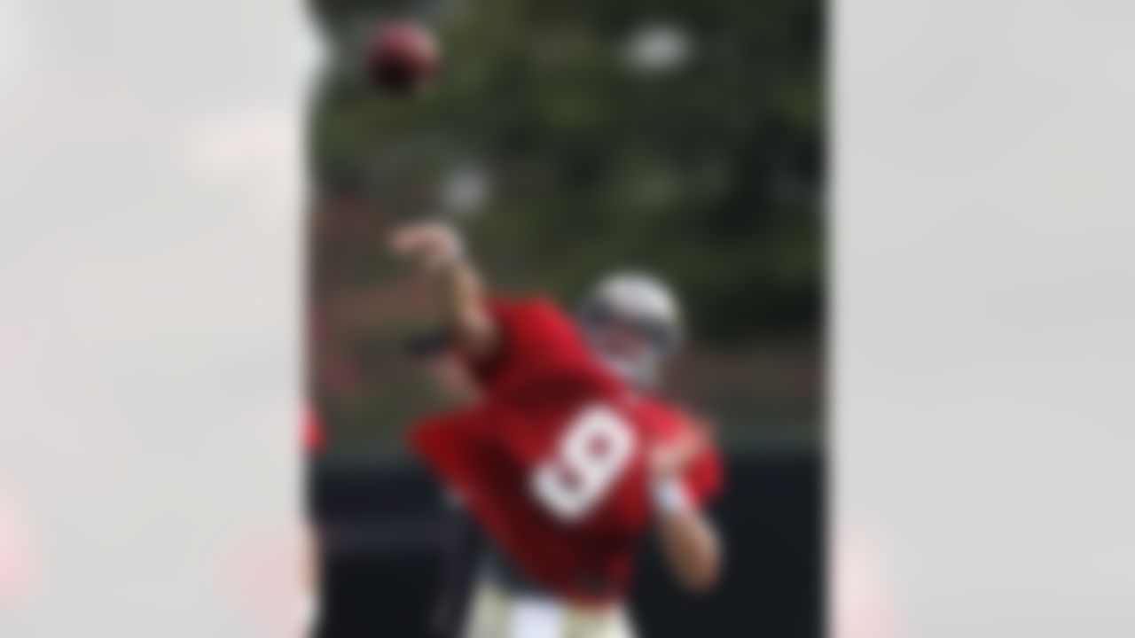 New Orleans Saints quarterback Drew Brees (9) passes during training camp at their NFL football training facility in Metairie, La., Saturday, July 28, 2012. (AP Photo/Gerald Herbert)