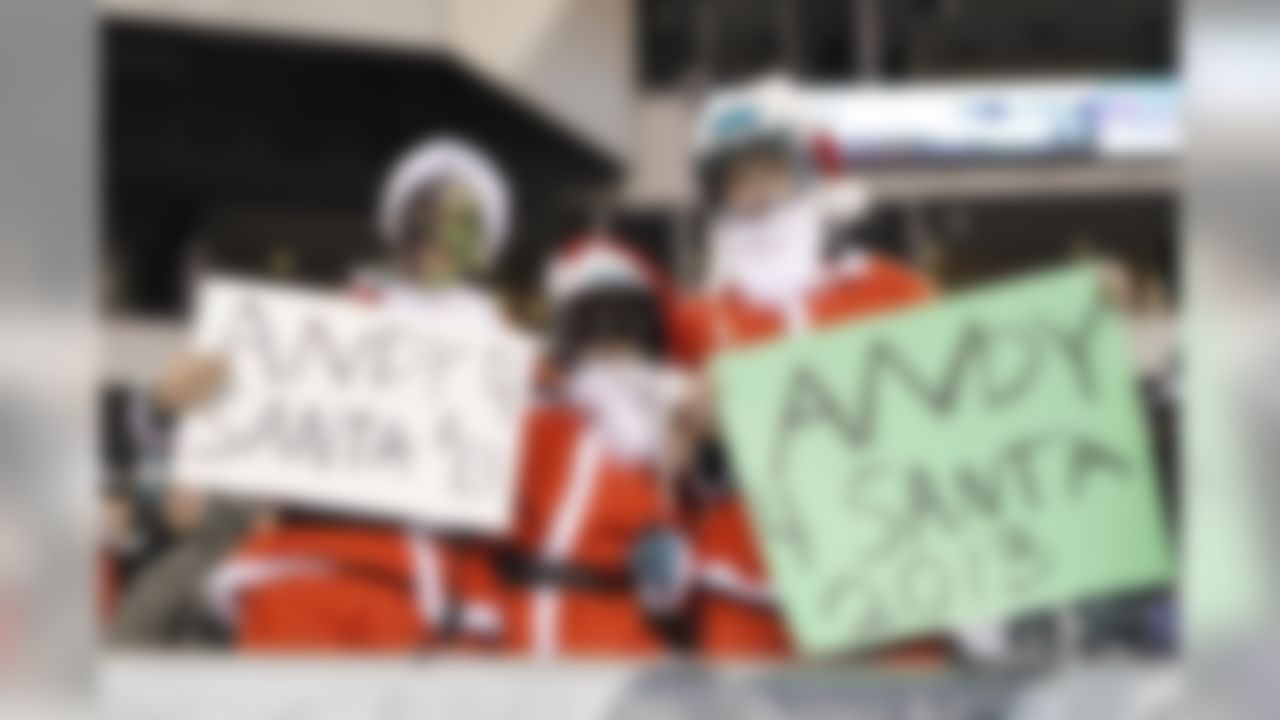 Young Philadelphia Eagles Fans dressed as Santa Claus hold signs that read "Andy 4 Santa 2013" during the NFL game between the Cincinnati Bengals and the Philadelphia Eagles on Thursday, December 12th 2012 in Philadelphia. The Bengals won 34-13. (AP Photo/Brian Garfinkel)