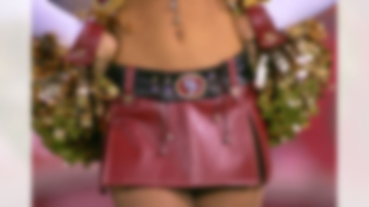 Detail of a San Francisco 49er Gold Rush cheerleader during the game against the San Diego Chargers at Monster Park in San Francisco, California on September 1, 2006. Photo by Ben Liebenberg/WireImage.