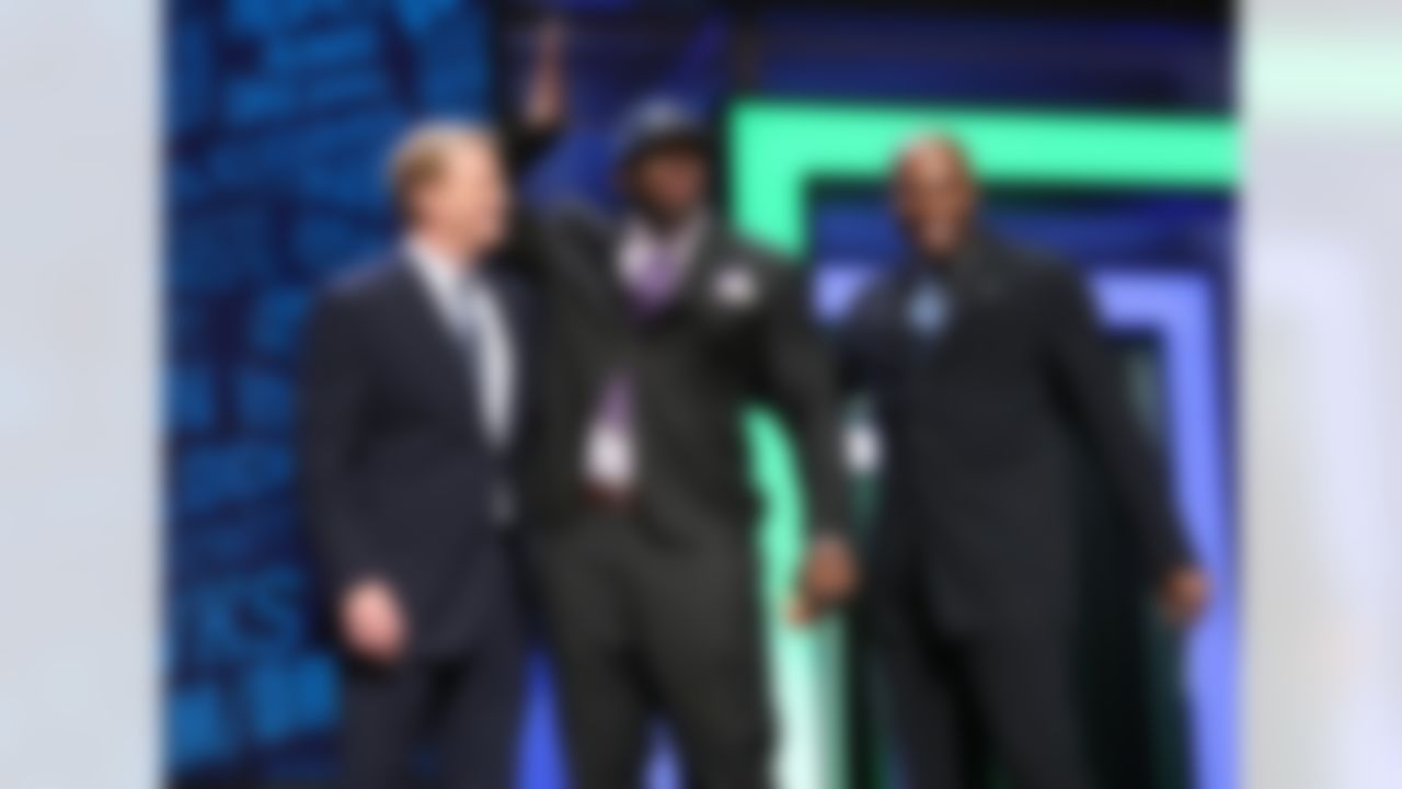 Alabama defensive tackle Jarran Reed poses for a photo with NFL Commissioner Roger Goodell and former Seattle Seahawks player Shaun Alexander after being selected by the Seahawks during the 2016 NFL Draft at the Auditorium Theatre on Friday, April 29, 2016 in Chicago. (Perry Knotts/NFL)