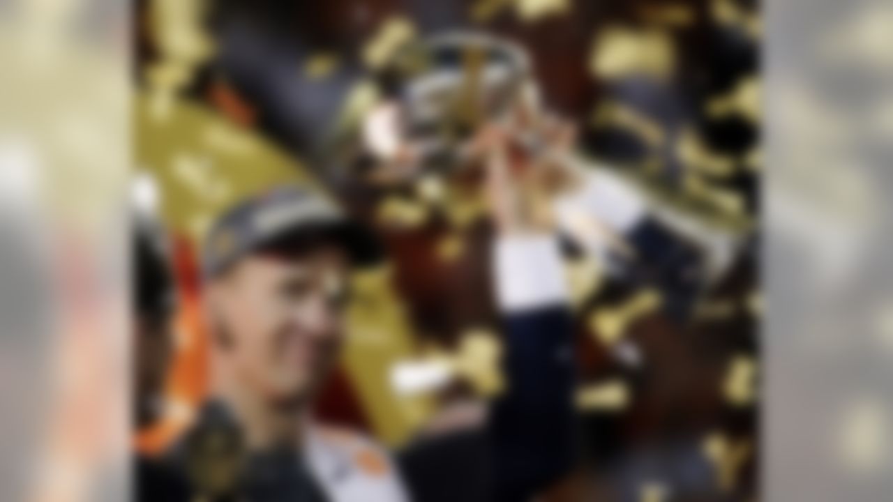 Denver Broncos� Peyton Manning holds up the trophy after the NFL Super Bowl 50 football game Sunday, Feb. 7, 2016, in Santa Clara, Calif. The Broncos won 24-10. (AP Photo/Matt York)