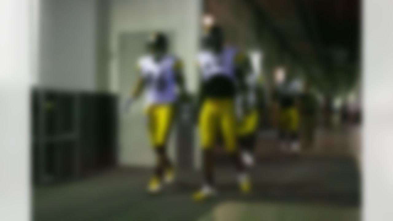 Pittsburgh Steelers wide receivers Hines Ward (86) and Mike Wallace (17) walk through the tunnel that leads to the field before an NFL game against the Arizona Cardinals on October 23, 20111. The Steelers defeated the Cardinals 32-20. (AP Photo/Kevin Terrell)