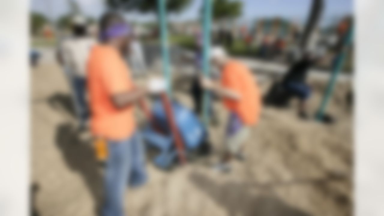 The Home Depot NFL Neighborhood MVP Build with Miami Dolphins Offensive Tackle Vernon Carey. (Photo by Andrew Coppley, CIA Stock Photography, Inc.)