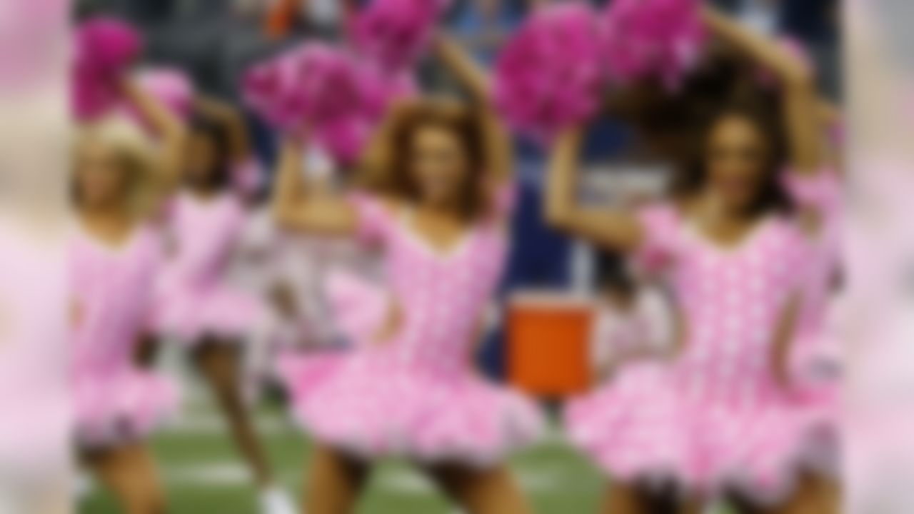 Dallas Cowboys cheerleaders wear pink in support of breast cancer awareness during the halftime show of an NFL football game Sunday, Oct. 6,2013, in Arlington, Texas. (AP Photo/Sharon Ellman)