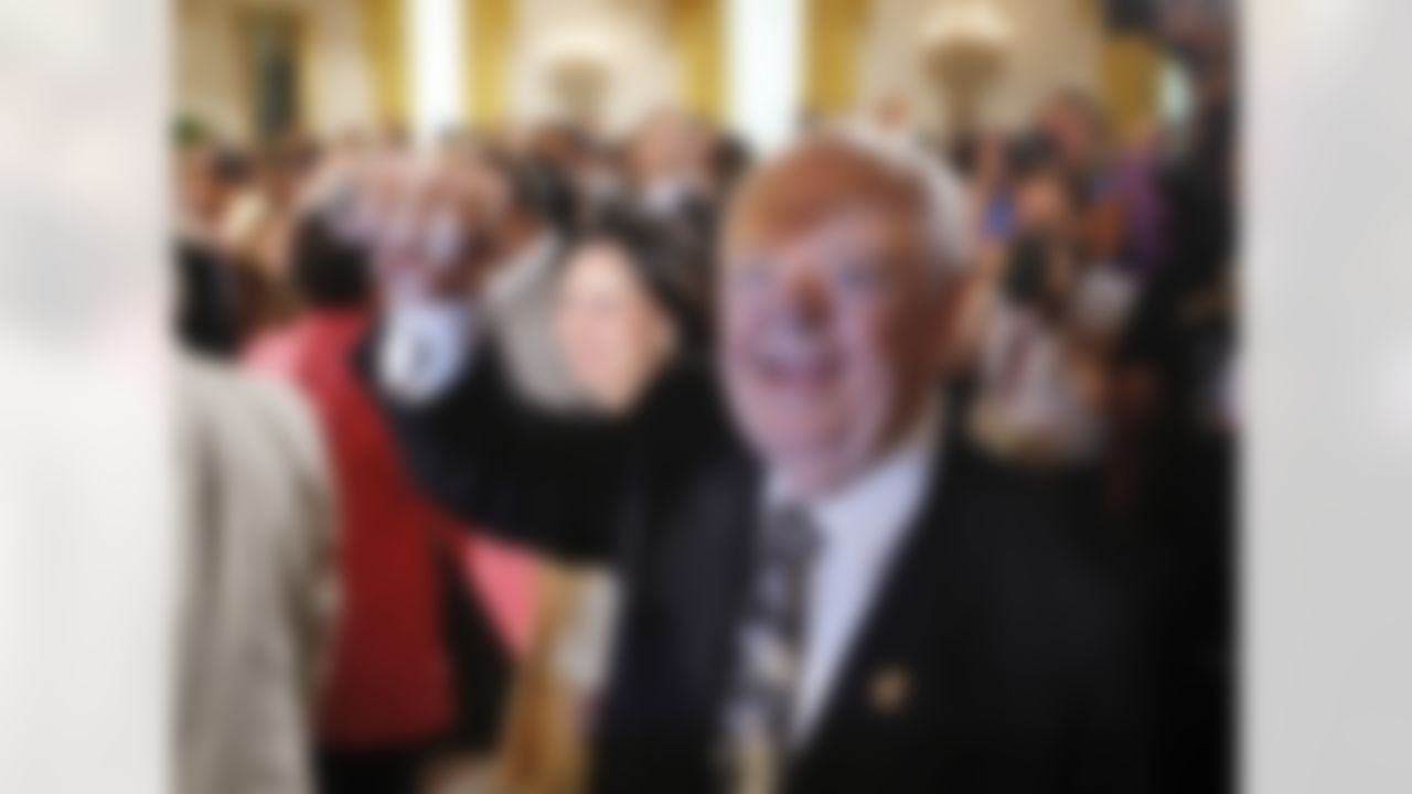 New Orleans Saints football team owner Tom Benson shows off his championship ring as he walks into the East Room of the White House in Washington, Monday, Aug. 9, 2010, before President Barack Obama welcomed the 2009 NFL Super Bowl Football Champions New Orleans Saints during a ceremony in the East Room . (AP Photo/Charles Dharapak)