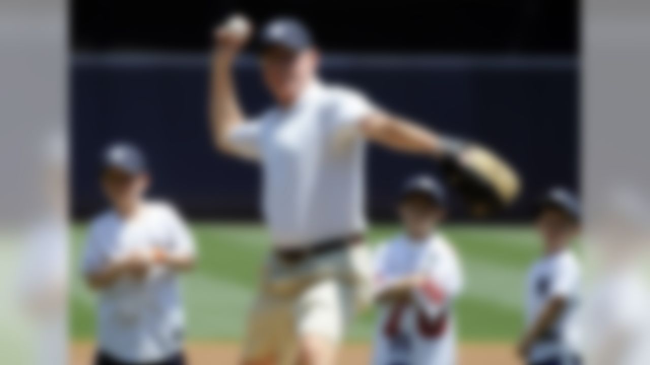 New York Giants coach Tom Coughlin throws out the ceremonial first pitch before the New York Yankees baseball game against the Chicago White Sox, Saturday, June 30, 2012, at Yankee Stadium in New York. (AP Photo/Bill Kostroun)