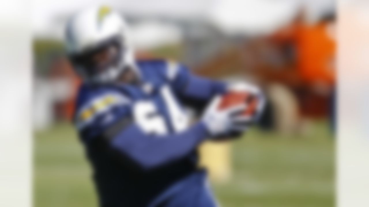 San Diego Chargers linebacker Melvin Ingram, the Chargers' first-round draft choice, picks off a a pass during NFL football training camp on Thursday, July 26, 2012, in San Diego. (AP Photo/Lenny Ignelzi)