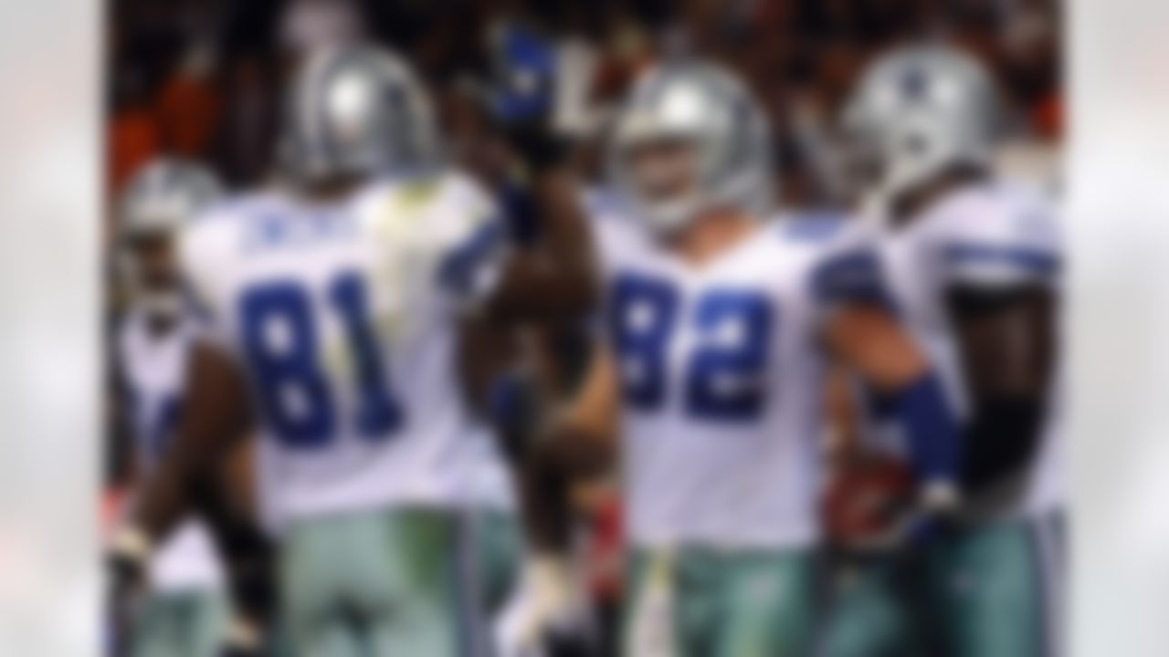 CHICAGO - SEPTEMBER 23: Jason Witten #82 and Terrell Owens #81 of the Dallas Cowboys celebrate after Witten scored a touchdown in the third quarter against the Chicago Bears at Soldier Field on September 23, 2007 in Chicago, Illinois. (Photo by Jonathan Daniel/Getty Images)