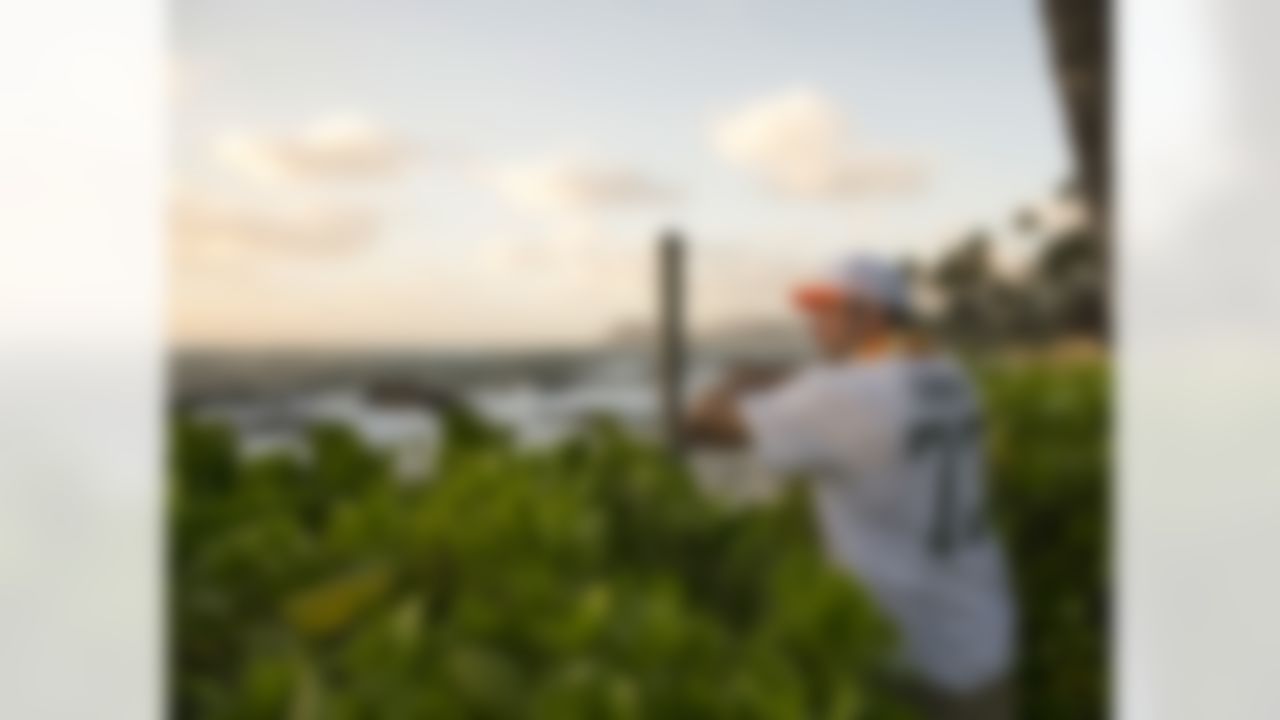 Cleveland Browns offensive tackle Joe Thomas looks out toward the ocean during the NFL football Pro Bowl draft, Wednesday, Jan. 22, 2014, Kapolei, Hawa.

 Thomas is a 10-time Pro Bowler, Thomas is 1 of 5 players in NFL history to be selected to the Pro Bowl in each of his first 10 seasons [Barry Sanders, Lawrence Taylor, Mel Renfro and Merlin Olsen], per NFL Research.