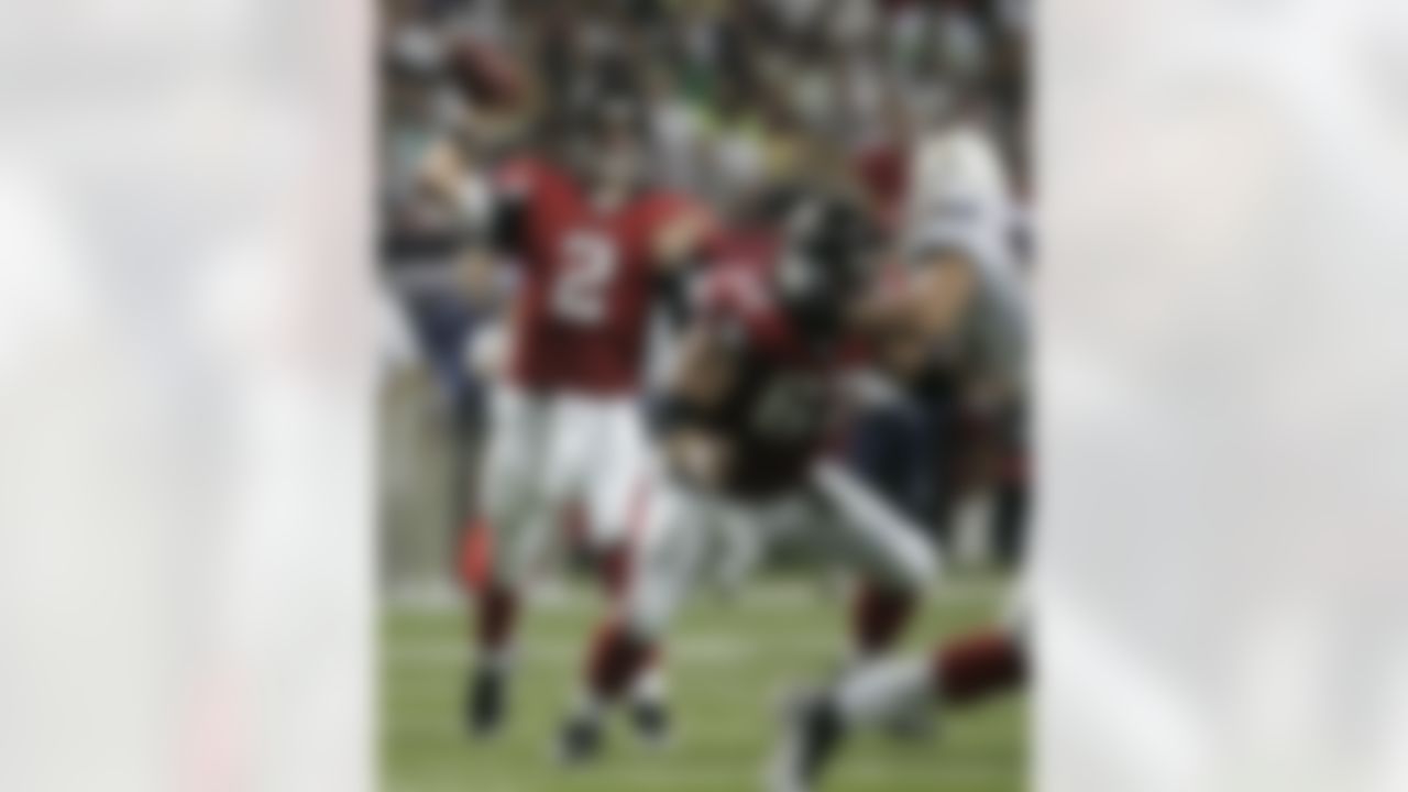 Atlanta Falcons quarterback Matt Ryan (2) passes as center Todd McClure (62) provides protection against the San Diego Chargers during the first half of their pre season NFL football game Saturday, Aug. 29, 2009, in Atlanta. (AP Photo/John Amis)