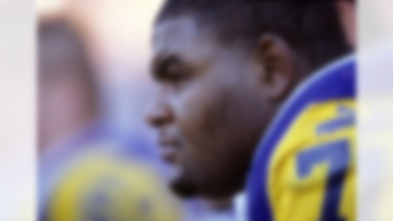 St. Louis Rams offensive lineman Orlando Pace (76) rests during an NFL game against the San Francisco 49ers on Sunday, Nov. 21, 1999, in San Francisco. (AP Photo/Greg Trott)