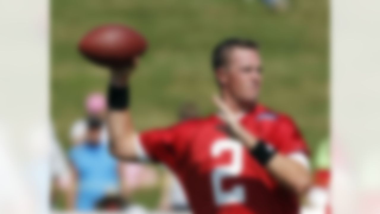 Atlanta Falcons quarterback Matt Ryan drops to pass during NFL football training camp in Flowery Branch, Ga., Thursday, July 26, 2012. (AP Photo/John Bazemore)
