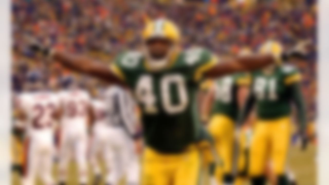 Green Bay Packers' running back Tony Fisher (40) reacts to a touchdown run in the second half against the Chicago Bears Sunday, Dec. 1, 2002, in Green Bay, Wis. Fisher rushed for 91 yards as the Packers won 30-20. (AP Photo/Mike Roemer)