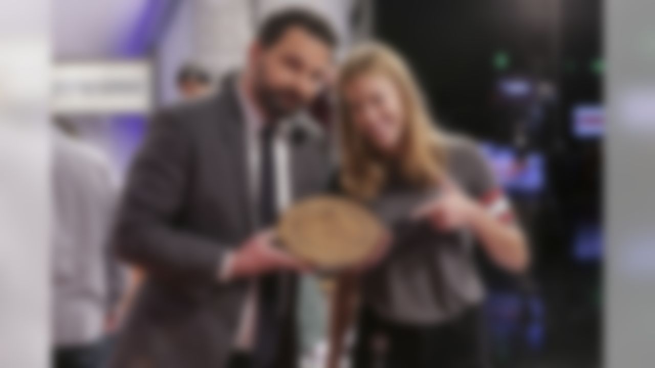 Pie-Off VI's "Rookie of the Year," Photo Editor Lindsay Amaral shows off her Pumpkin Cheescake Pie, November 29, 2018, (Mackenzie Possee/NFL)