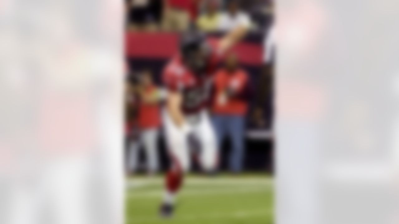 ATLANTA, GA - SEPTEMBER 30: Linebacker Keith Brooking #56 of the Atlanta Falcons celebrates a defensive stop against the Houston Texans at the Georgia Dome on September 30, 2007 in Atlanta, Georgia. (Photo by Al Messerschmidt/Getty Images)