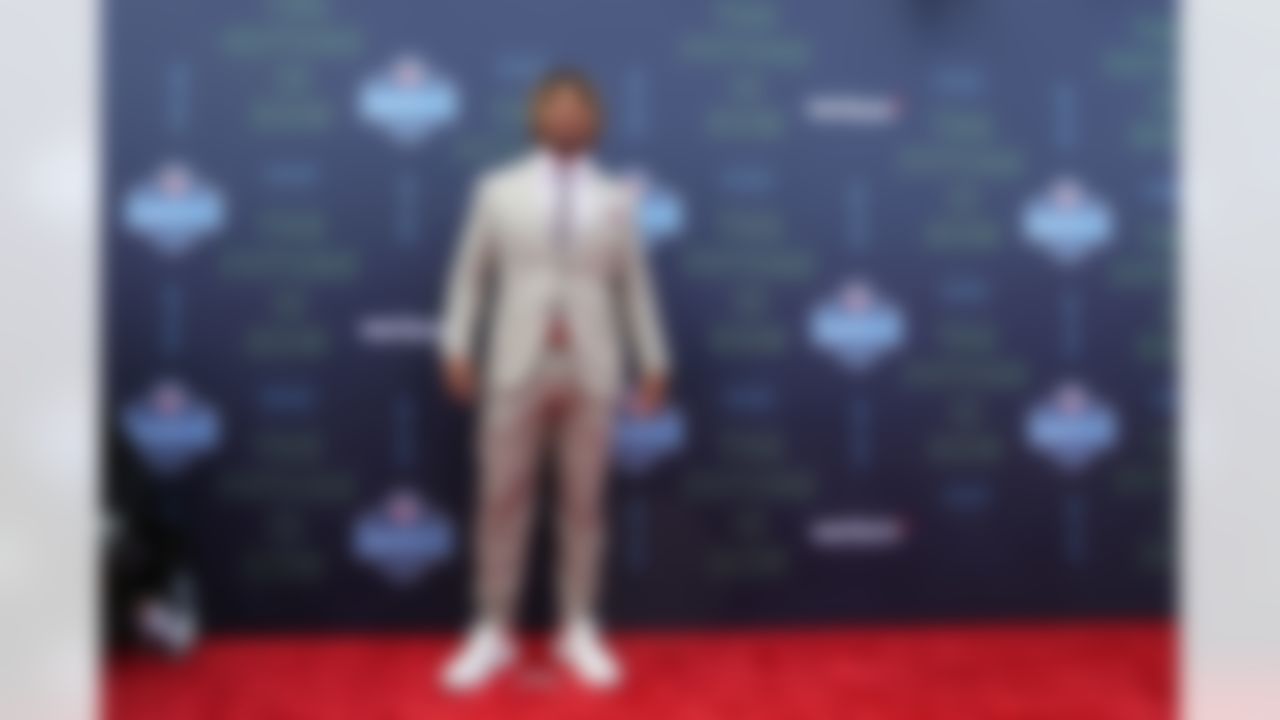 LSU running back Derrius Guice poses for photos.