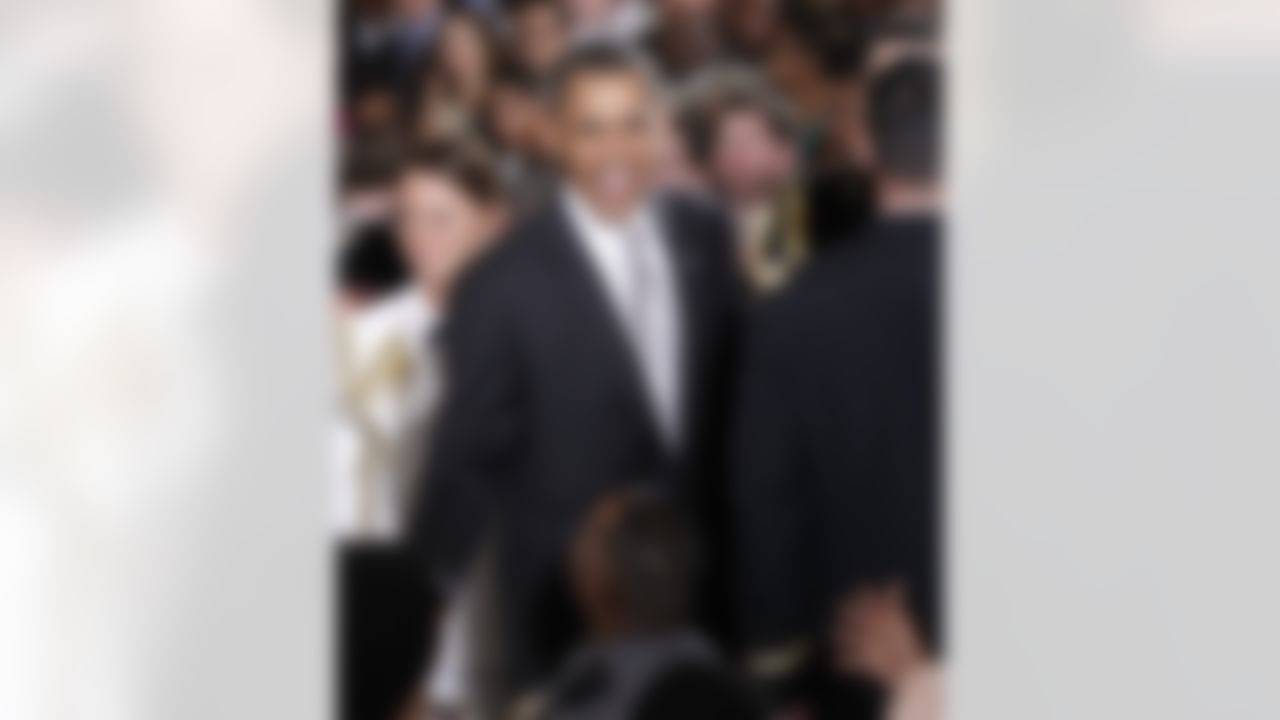 President Barack Obama reacts to recognizing a guest in the East Room of the White House in Washington, Monday, Aug., 9, 2010, during a ceremony honoring the 2009 NFL Super Bowl NFL Football Champions New Orleans Saints. (AP Photo/Pablo Martinez Monsivais)