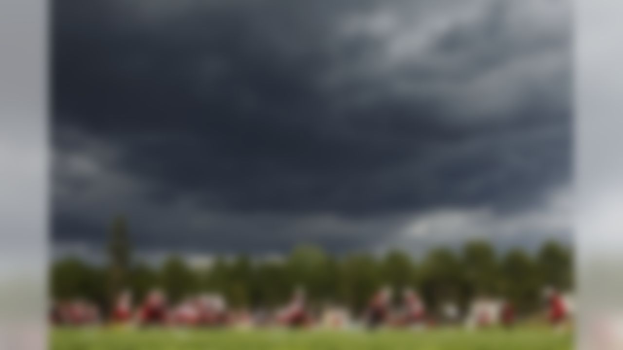 Storm clouds move in over the first day of the Arizona Cardinals' NFL football training camp at Northern Arizona University, Wednesday, July 25, 2012, in Flagstaff, Ariz. (AP Photo/Ross D. Franklin)