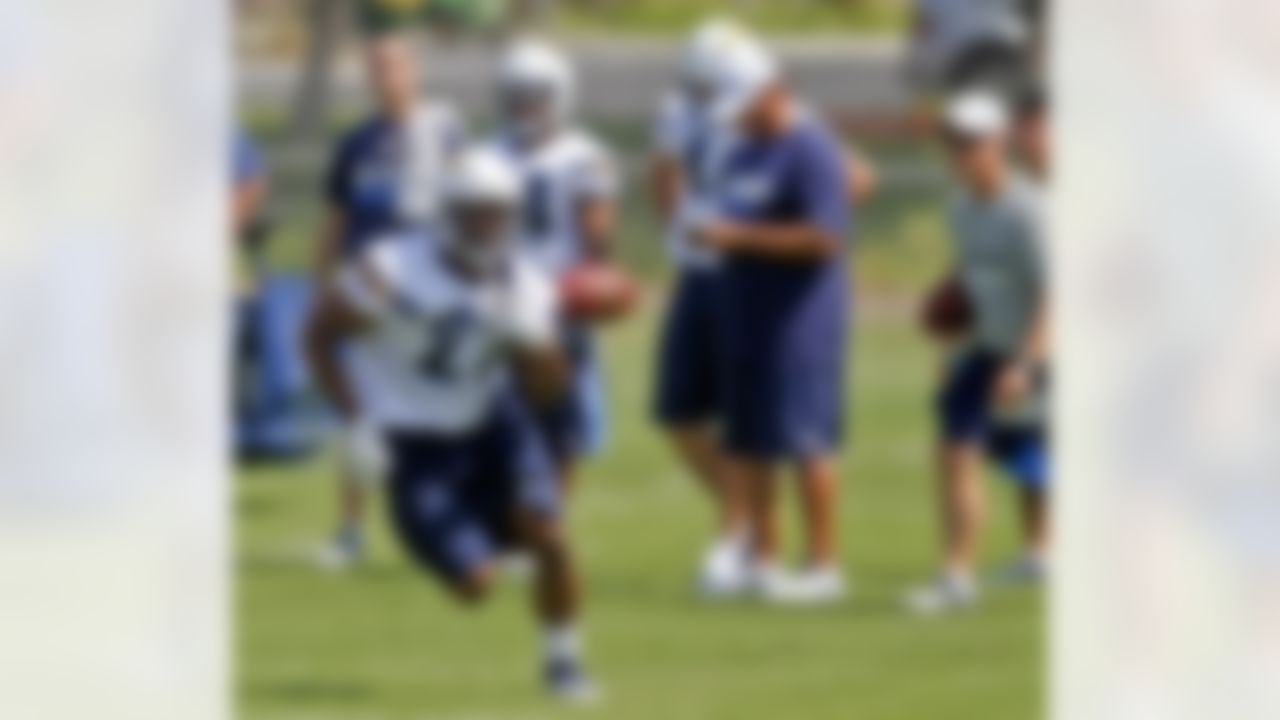 San Diego Chargers rookie running back Edwin Baker, from Michigan State, looses his grip on the ball while running during practice at the Chargers' training camp Monday, July 23, 2012 in San Diego. (AP Photo/Lenny Ignelzi)