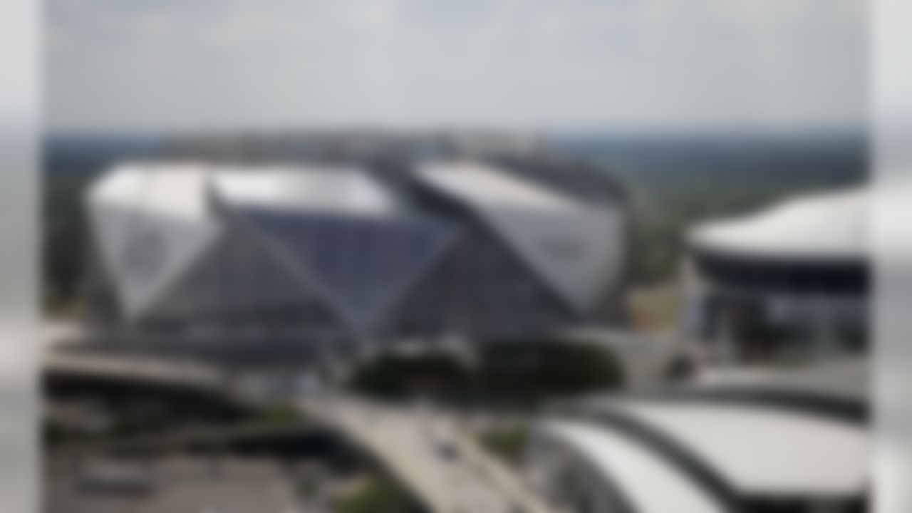Mercedes-Benz Stadium the future home of the Atlanta Falcons is shown next to theGeorgia Dome, right, Friday, May 19, 2017, in Atlanta. (AP Photo/John Bazemore)