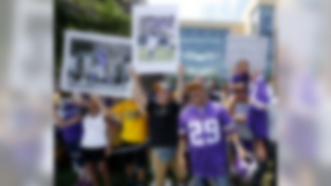 Fans chant for Minnesota Vikings running back Adrian Peterson as Peterson reports to an NFL football training camp Saturday, July 25, 2015, in Mankato, Minn. (Charles Rex Arbogast/Associated Press)