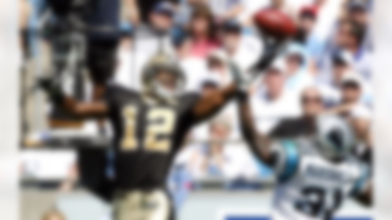 New Orleans receiver Marques Colston (12) fails to pull in a touchdown reception against Carolina defender Richard Marshall (31) during the first half Sunday, October 1, 2006, at Bank of America Stadium in Charlotte, North Carolina. Photo by Getty Images.